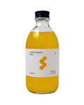 Smoothiebody Bath Red Mandarin – 300ml glass bottle with black cap, white label, yellow liquid – body care