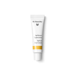 Dr. Hauschka Aprikosen Tagescreme – weiße Tube mit gelber Linie, weißem Verschluss, weißem Hintergrund – Hautpflege