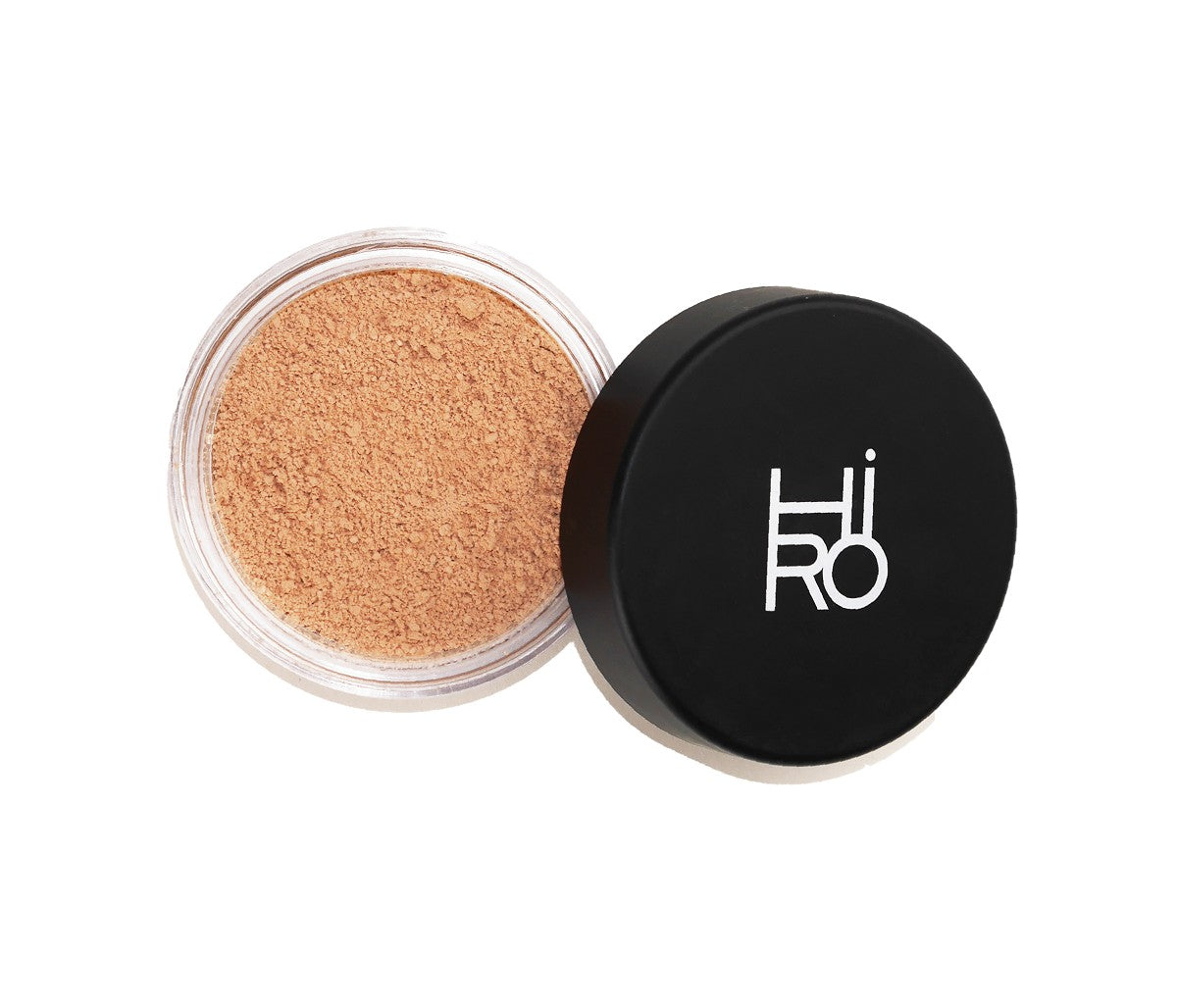 Hiro Mineral Foundation Magnolia SPF 25 – durchsichtige Dose, schwarzer Deckel, weißer Hintergrund – Make-up