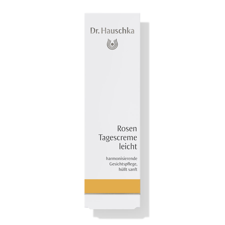 Dr. Hauschka Rosen Tagescreme leicht – weiße Tube mit goldener Linie, weißer Hintergrund – Gesichtspflege
