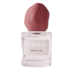 Fascent Red Flag Eau de Parfum – clear glass bottle with pink fabric cap, white label, white background – perfume