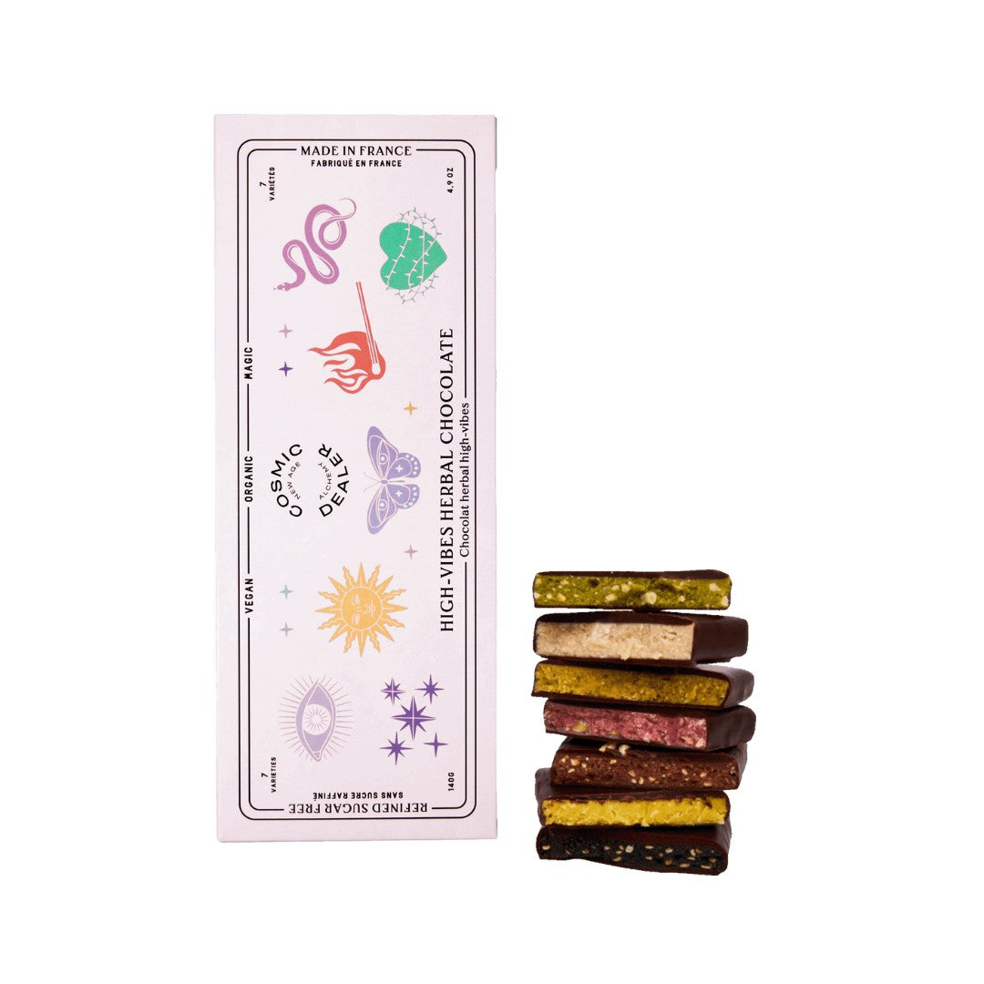 Osmic Delater High-Vibes Herbal Chocolate – rosa Verpackung 140g, 7 Sorten, weißer Hintergrund – vegane Schokolade