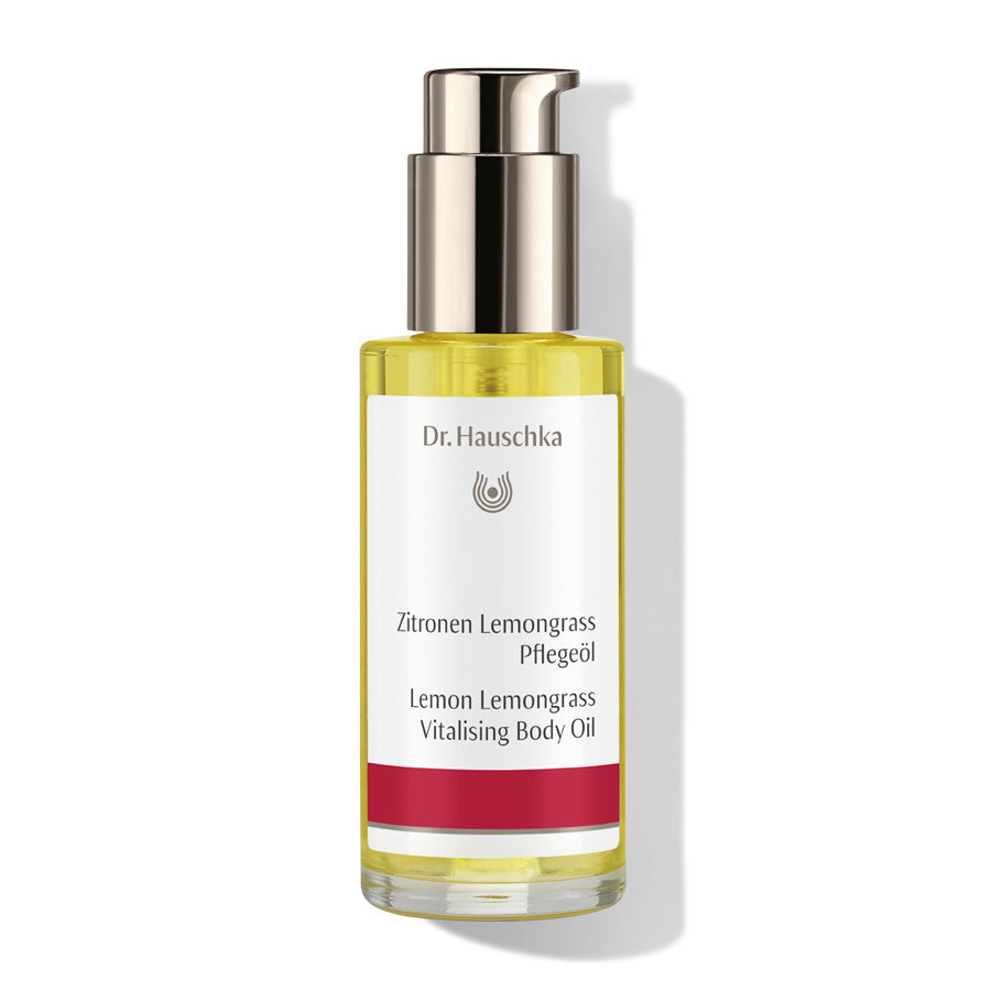 Dr. Hauschka Zitronen Lemongrass Pflegeöl – klares Glasfläschchen mit Pumpverschluss, weiß-rotes Etikett, weißer Hintergrund – Körperpflege
