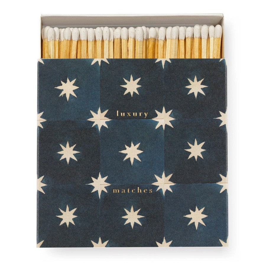 Navy Star Tile Luxury Matches – dark blue box with star pattern, white background – decor