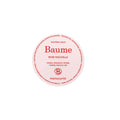 Manucurist Baume Rose Nouvelle in a jar with a pink lid on a white background, skin care