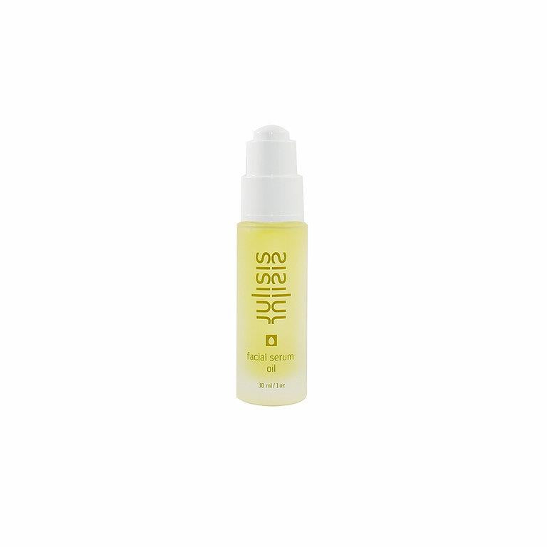 Sisley Facial Oil Serum – durchsichtige Flasche 30ml, weißer Pumpverschluss, weißer Hintergrund – Gesichtspflege