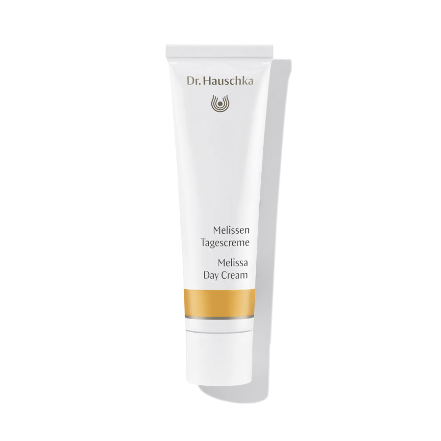Dr. Hauschka Melissa Day Cream – white tube with gold stripe, white cap, white background – skin care