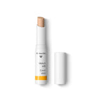 Dr. Hauschka Abdeckstift 01 Natural – weißer Stift mit orangefarbenem Band, weißem Deckel, weißem Hintergrund – Concealer