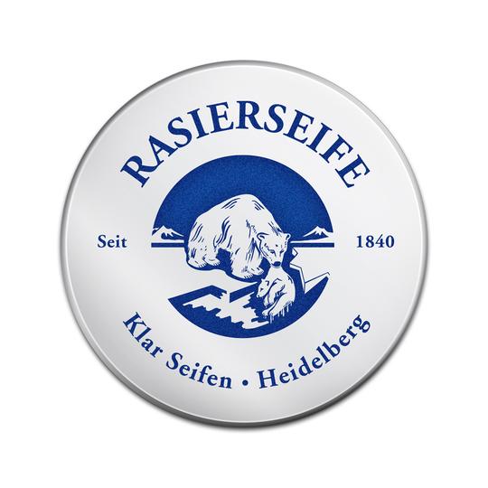 Rasierseife Sport – runder Metalldeckel mit blauem Eisbären-Logo, weißem Hintergrund – Rasurpflege