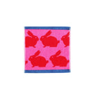 Kissing Rabbits Organic Cotton Face Cloth – pink with red rabbits, blue border, white background – skin care