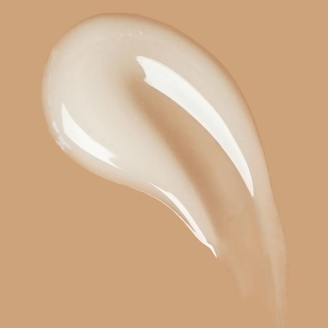 Air Dry Styling Cream – creamy texture on beige background – hair care