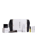 Le Prunier Signature Mini Set – white packaging with black pouch, assorted mini products, white background – skin care