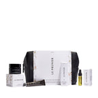 Le Prunier Signature Mini Set – white packaging with black pouch, assorted mini products, white background – skin care