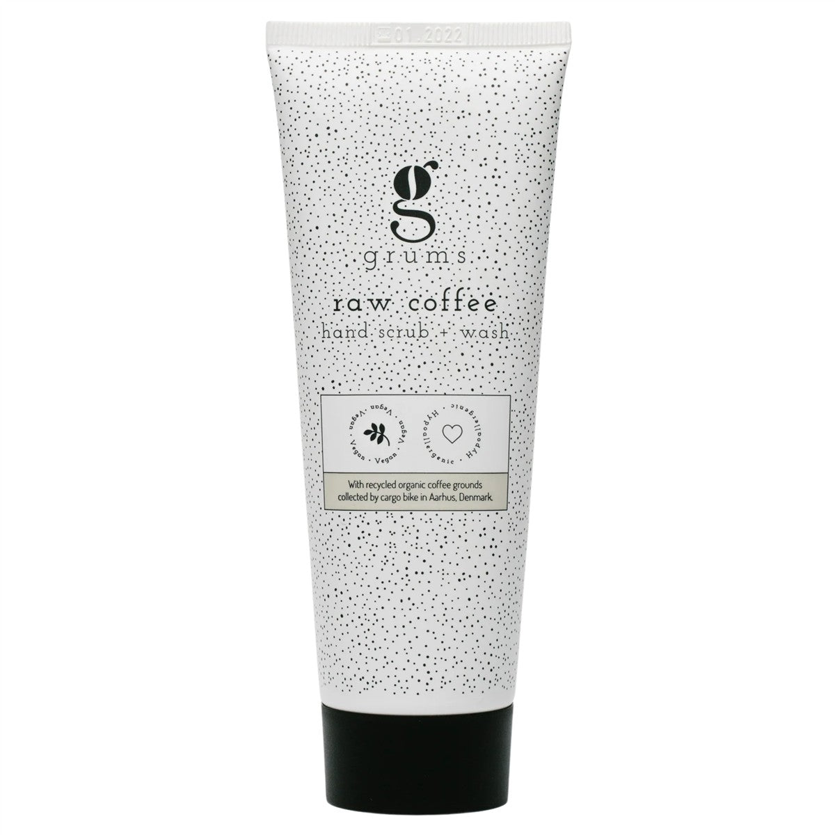 Grums Raw Coffee Hand Scrub + Wash – weiße Tube mit schwarzen Punkten, schwarzer Verschluss, weißem Hintergrund – Handpflege