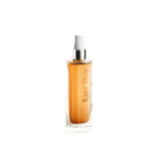 Kjaer Weis Toner – clear spray bottle with amber liquid, silver nozzle, white background – skin care