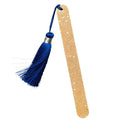 Nail file with pom-pom – gold with blue tassel, white background – nail care