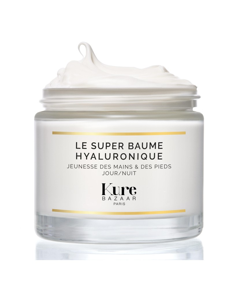 Kure Bazaar Le Super Baume Hyaluronique – durchsichtiger Glasbehälter, weißer Inhalt, goldene Akzente, weißer Hintergrund – Hautpflege