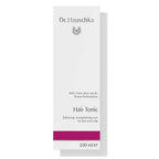 Dr. Hauschka Hair Tonic – white cardboard packaging 100 ml, purple accent, white background – hair care