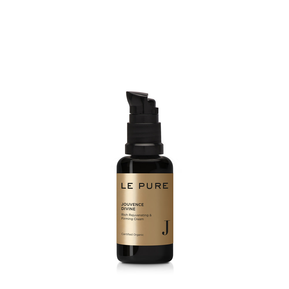 LE PURE Jouvence Divine – schwarze Flasche mit Pumpspender, goldene Etikette, weißer Hintergrund – Hautpflege