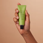 absolution Le Masque Pureté Detoxifiant – green tube with black cap, beige background – face mask