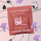 Cosmic Dealer Nut Butter Chocolate – brown single-serve pouch, purple floral background – chocolate