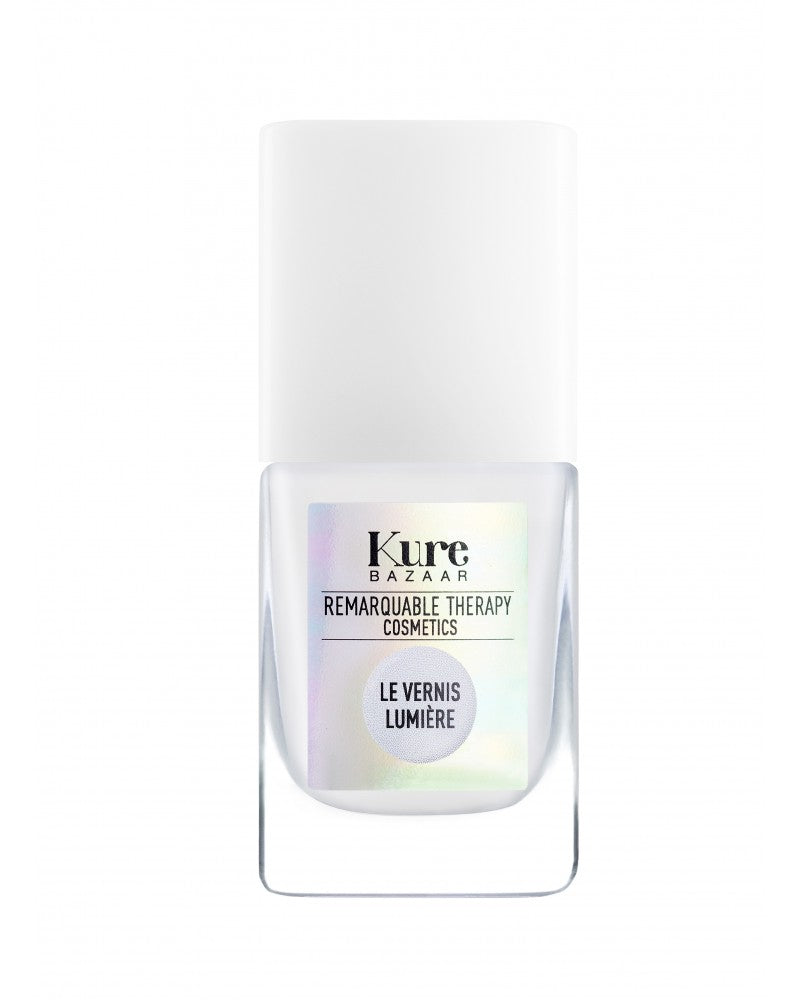 Kure Bazaar Remarquable Therapy Le Vernis Lumière – klares Glasfläschchen, weißer Deckel, weißer Hintergrund – Nagelpflege