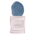 Fascent Corn Star Eau de Parfum – klares Glasfläschchen 30ml, blauer Sprühkopf, weißer Hintergrund – Parfüm