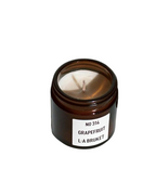 L:A Bruket No. 314 Grapefruit Candle – brown glass jar, white label, white background – scented candles