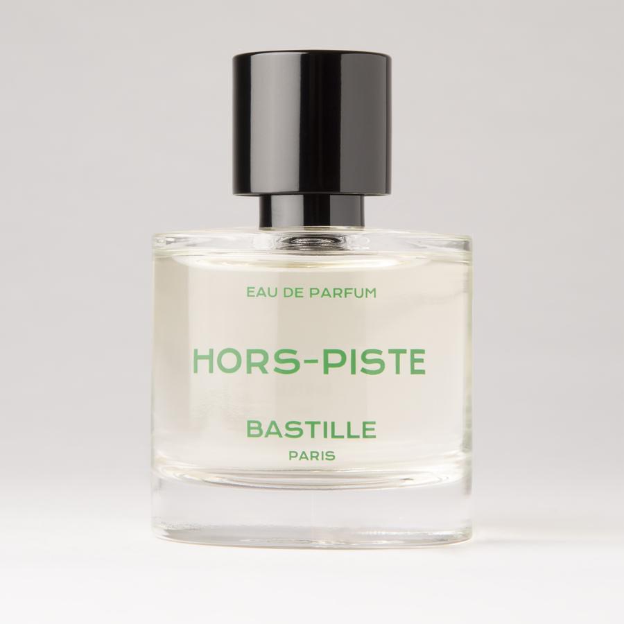 Hors-piste Eau de Parfum 50ml – klares Glasflakon mit schwarzem Deckel, grüner Schrift, weißem Hintergrund – Parfüm