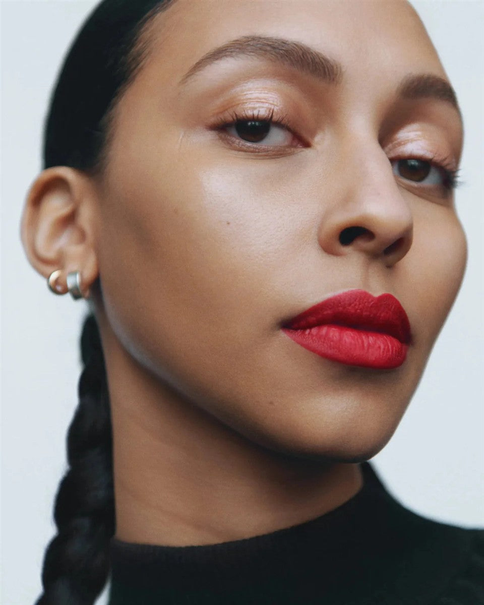 Lip & Eye Liner – product not visible, model with red lips on white background – makeup
