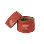 She Slept for 100 Years Tea – round red tin with lid, white background – relaxing tea blend