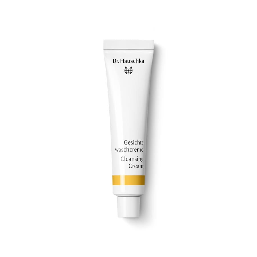 Dr. Hauschka Gesichtswaschcreme – weiße Tube mit goldener Linie, weißem Verschluss, weißem Hintergrund – Hautreinigung
