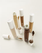 ILIA Skin Blur Serum Concealer – clear tube with white cap, multiple shades on light background – skin care