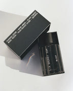 L:A Bruket No. 334 Blixt Eau de Parfum – black glass spray bottle, black box, white background – perfume