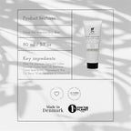Grums Raw Espresso Gesichtspeeling – weiße Tube 80ml, schwarzer Deckel, grauer Hintergrund mit Schatten – Hautpflege