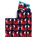 Kissing Foxes Organic Cotton Hand Towel in dark blue with red foxes on a white background, bathroom accessory