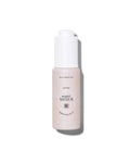 Agent Nateur Holi (oil) Ageless Face Sérum in einer blassrosa Flasche mit weißem Pumpspender für die Hautpflege.