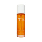 RMS Beauty Kakadu Beauty Body Oil, orangefarbene Flasche mit weißem Verschluss auf weißem Grund, Körperpflege