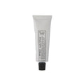 L:A Bruket No. 092 Handcream in weißer Tube mit schwarzem Schraubverschluss vor weißem Hintergrund, Hautpflege.