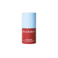 Absolution Le Baume in einer rot-blauen Tube auf weißem Hintergrund für die Hautpflege.