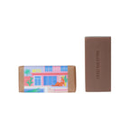 Longe Côte Soap in brown paper packaging with a motel illustration on a white background for skin care.