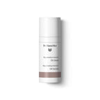 Dr. Hauschka Regeneration Intensiv Öl Elixier in einer weißen Flasche mit weißem Verschluss für die Hautpflege.