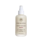 Innersense Overnight Repair Serum in einer cremefarbenen Flasche mit weißer Pumpe, Haarpflege.