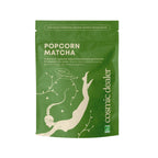Cosmic Dealer Popcorn Matcha in grüner Beuteltüte auf weißem Hintergrund, Bio-Matcha Tee