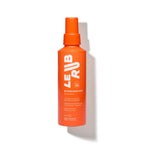 Le Rub Sunscreen Mist SPF 50 orange spray bottle, on white background for skin care.