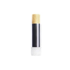 Tinted Lip Balm Clear in a silver tube with light beige balm on a white background. Lip care.
