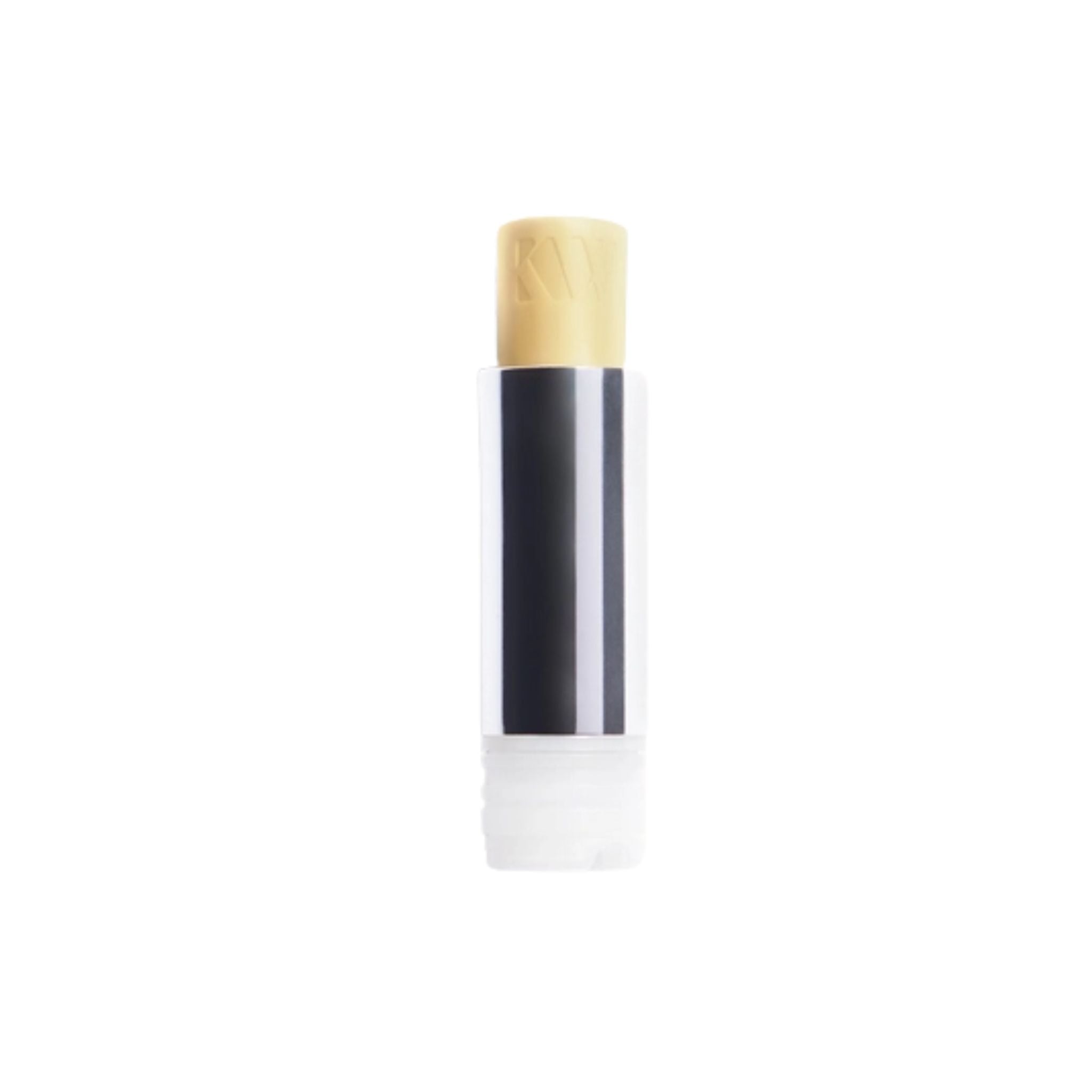 Tinted Lip Balm Clear in a silver tube with light beige balm on a white background. Lip care.