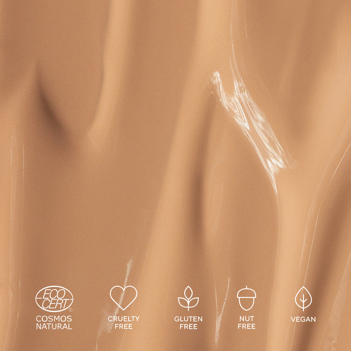 Golden Sand 50 Swatch, Text: Cruelty Free, Cosmos Natural, Vegan, Nut free, Gluten free